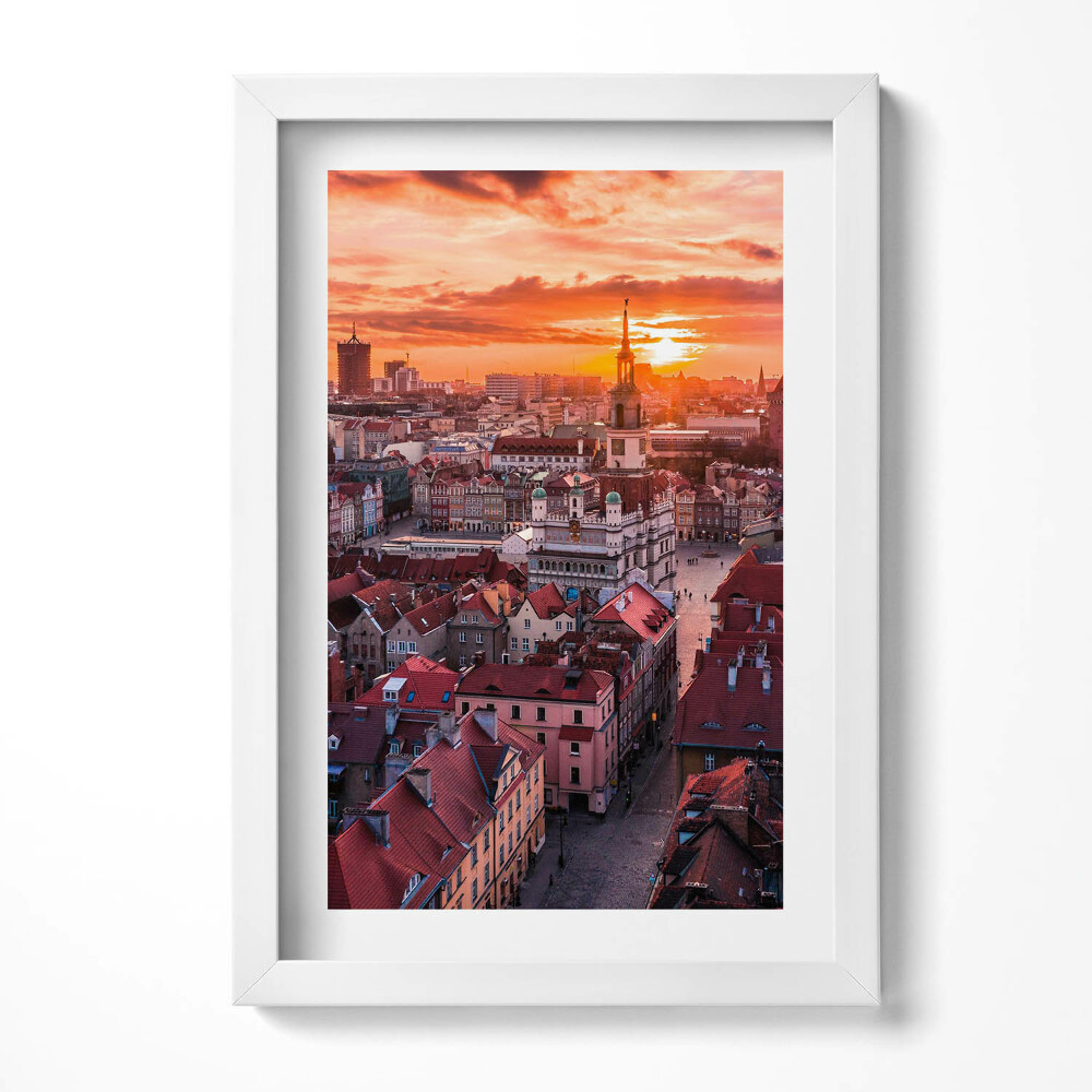 Keretezett kép Naplemente városi tájképe