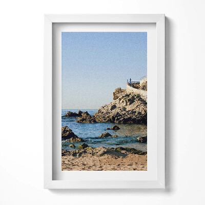 Keretezett kép Tengerparti sziklákkal és kék vízzel
