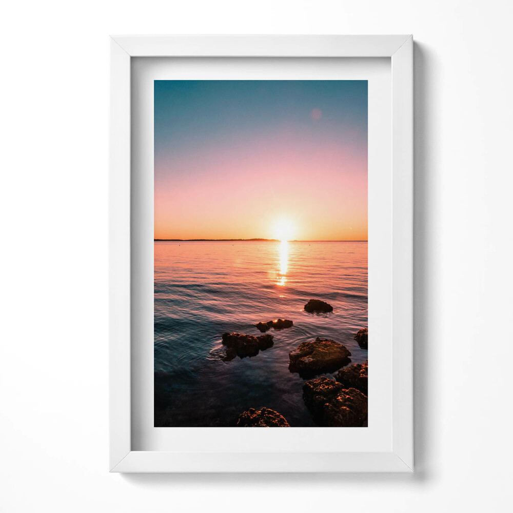 Keretezett kép Naplemente a víz felett