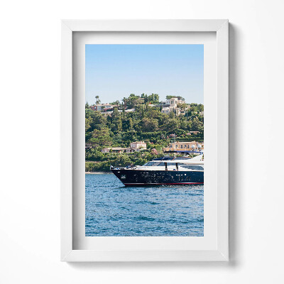 Keretezett kép Jacht a tengerparti táj előtt
