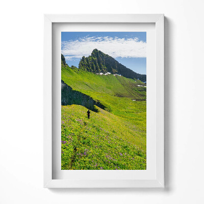 Keretezett kép Zöld dombok hegyek felhők