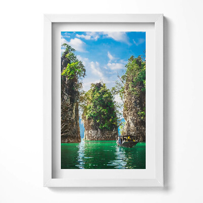 Keretezett kép Tengerparti sziklaalakzatok csónak