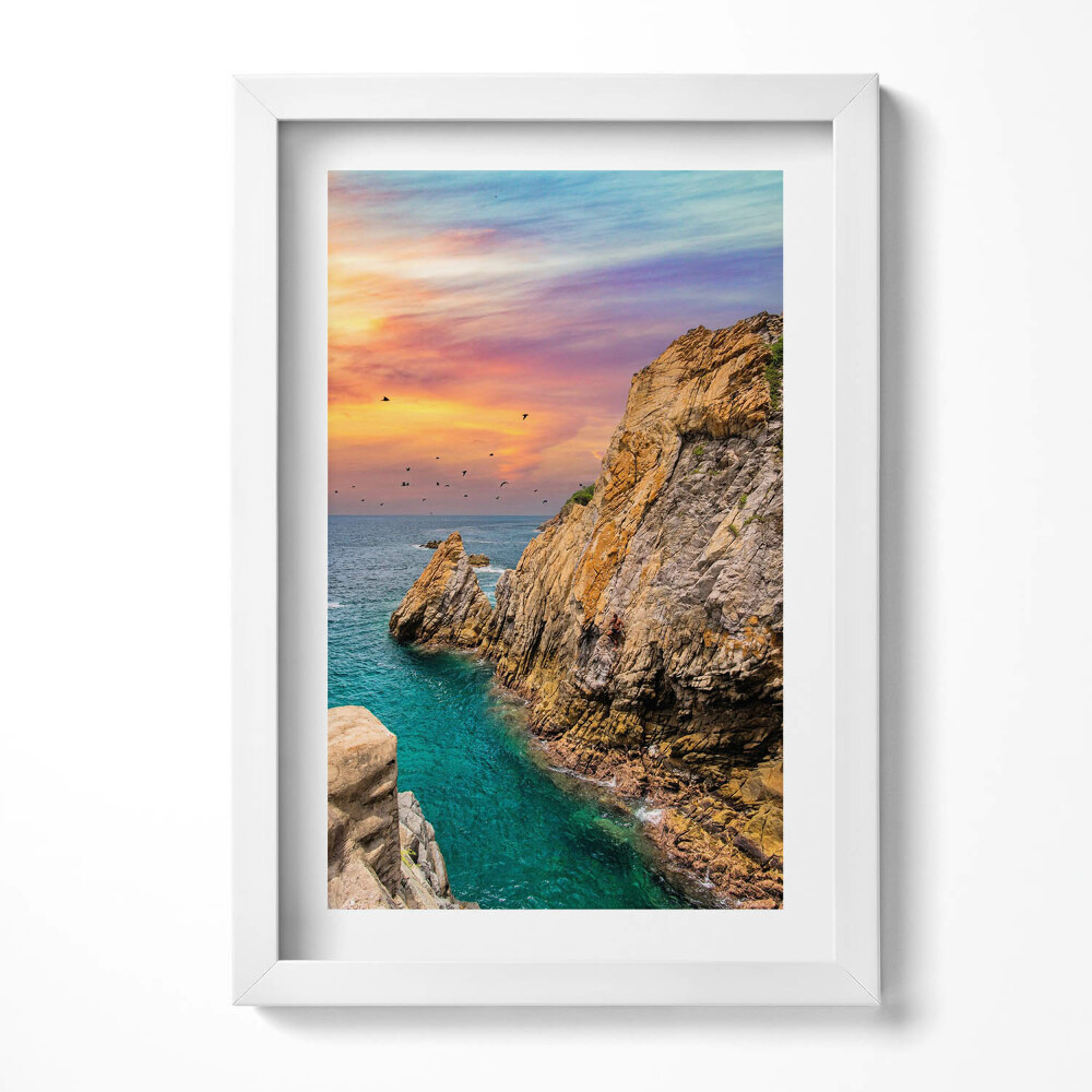 Keretezett kép Tengerparti szikla naplementében