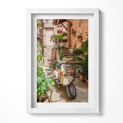 Keretezett kép Vespa robogó egy virágos udvarban