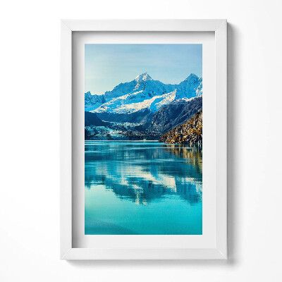 Keretezett kép Havas hegyek tükörsima tó