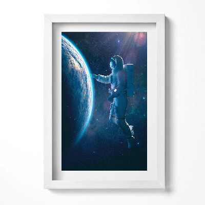 Keretezett kép Űrhajós az űrben Föld felé nyúlva