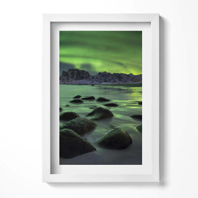 Keretezett kép Északi fény és sziklás táj