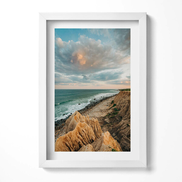Keretezett kép Tengerparti sziklák és felhők