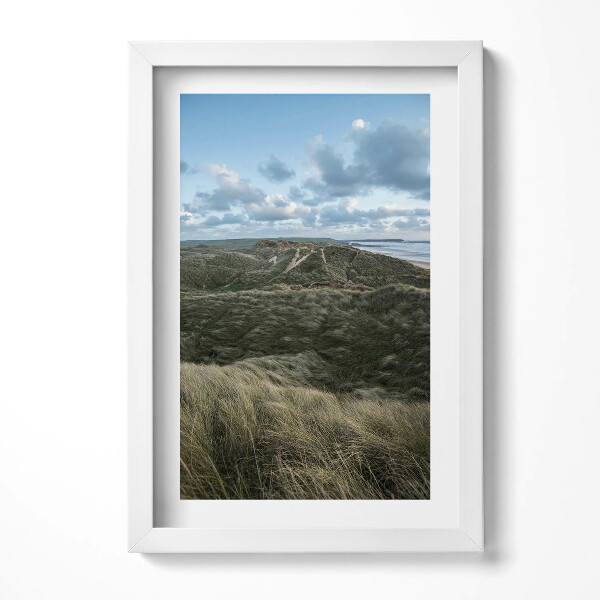 Keretezett kép Tengerparti dűnék és felhős ég