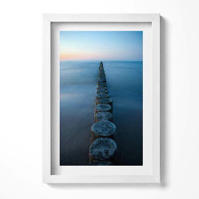 Keretezett kép Tengerparti stég naplementében