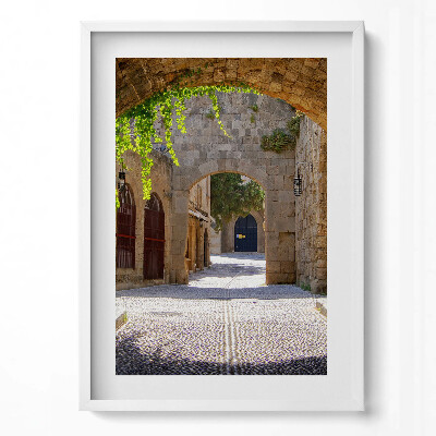 Függőleges kép keretben Középkori városkapu macskaköves utca