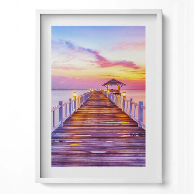 Függőleges kép keretben Tengerparti móló naplementében