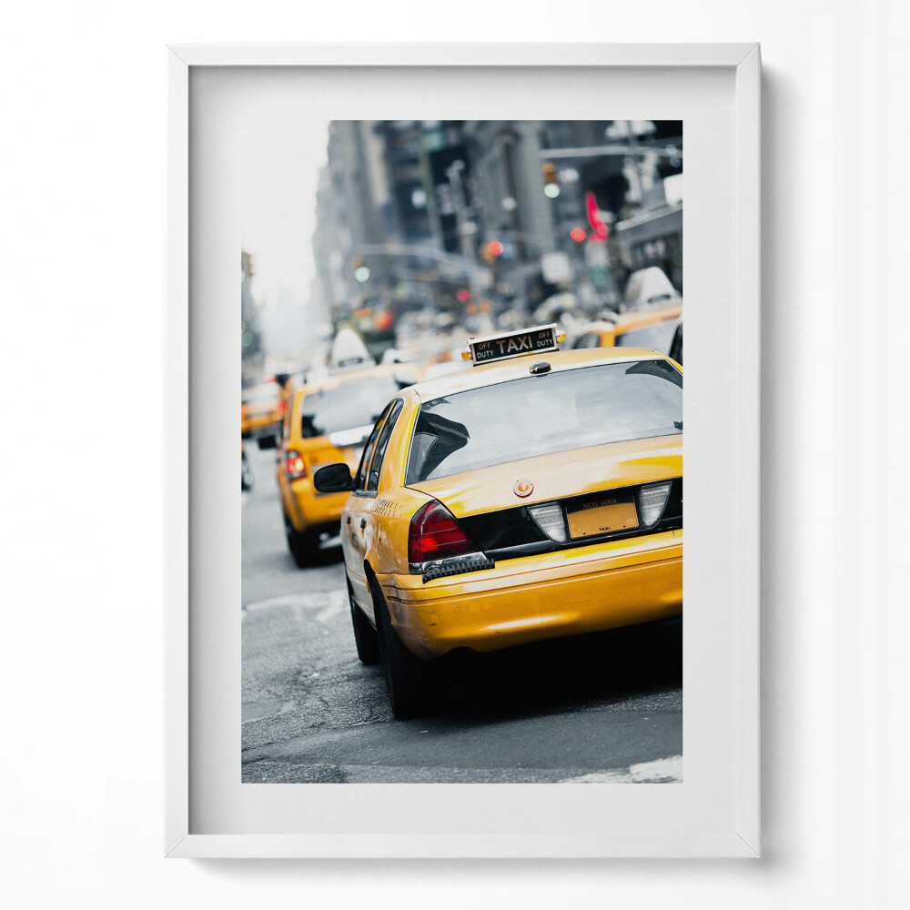 Függőleges kép keretben Sárga taxi autók városi forgalomban