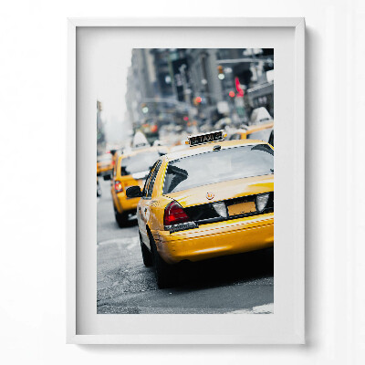 Függőleges kép keretben Sárga taxi autók városi forgalomban