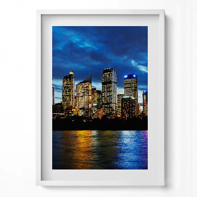 Függőleges kép keretben Modern város látképe éjszaka