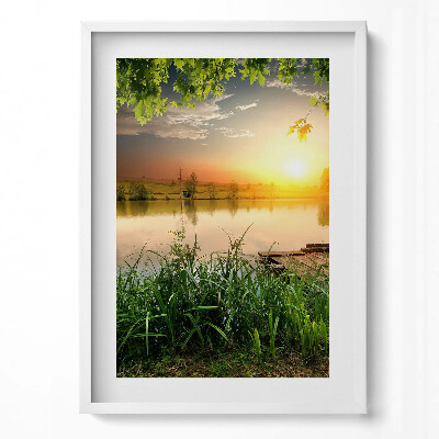 Függőleges kép keretben Naplemente a vízparton