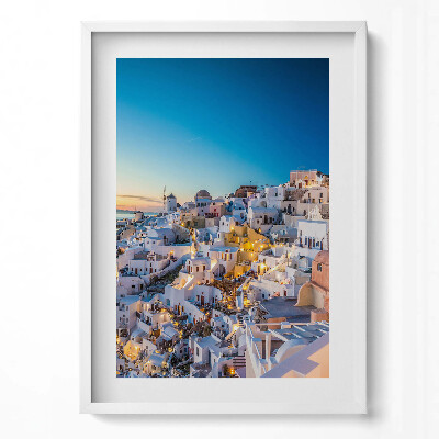 Függőleges kép keretben Fehér házak kék kupolák naplemente