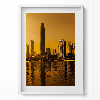 Függőleges kép keretben Modern városkép naplementében