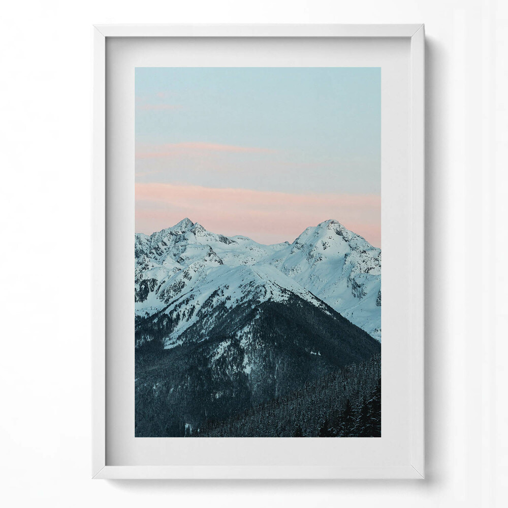 Függőleges kép keretben Havas hegyek naplementében