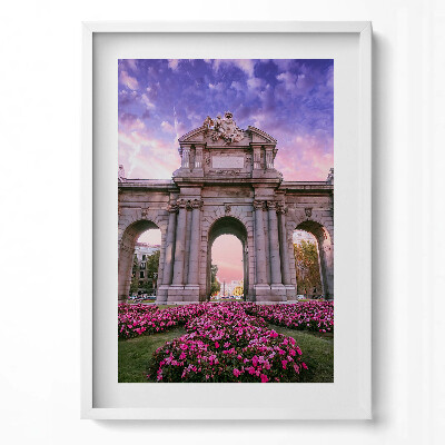 Függőleges kép keretben Gyönyörű diadalív virágokkal