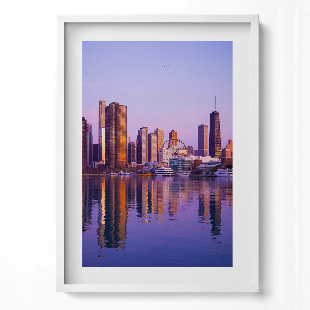 Függőleges kép keretben Városi táj naplementében