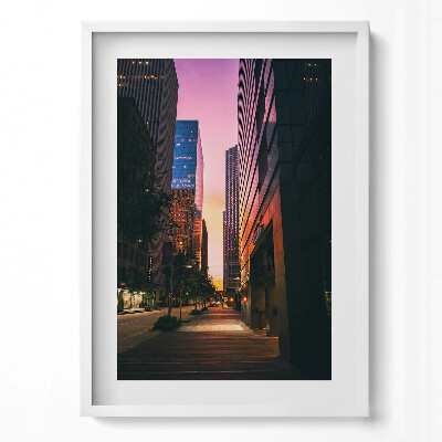 Függőleges kép keretben Modern városi táj naplementében