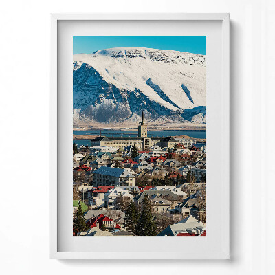 Függőleges kép keretben Havas hegyek és városi táj