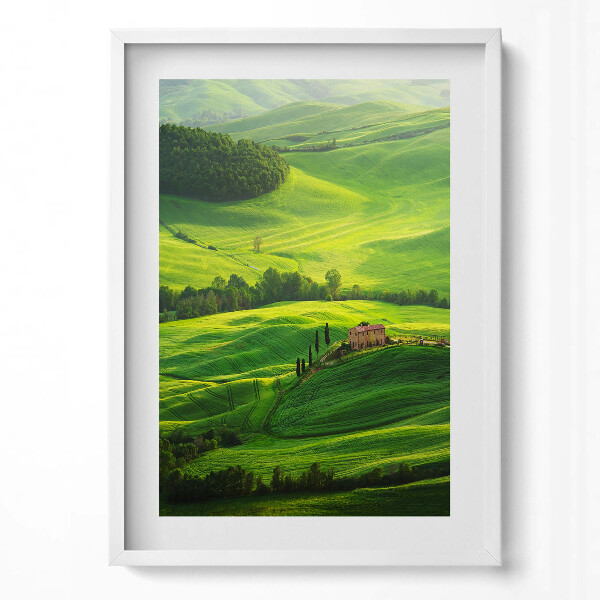 Függőleges kép keretben Zöld dombok és ház