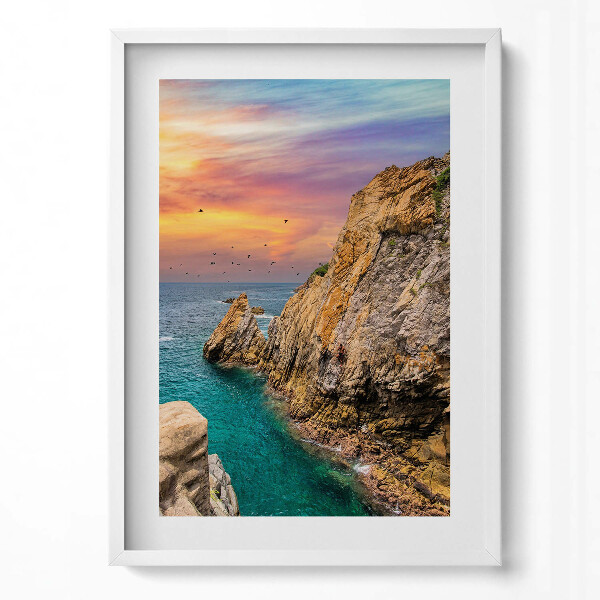 Függőleges kép keretben Tengerparti szikla naplementében