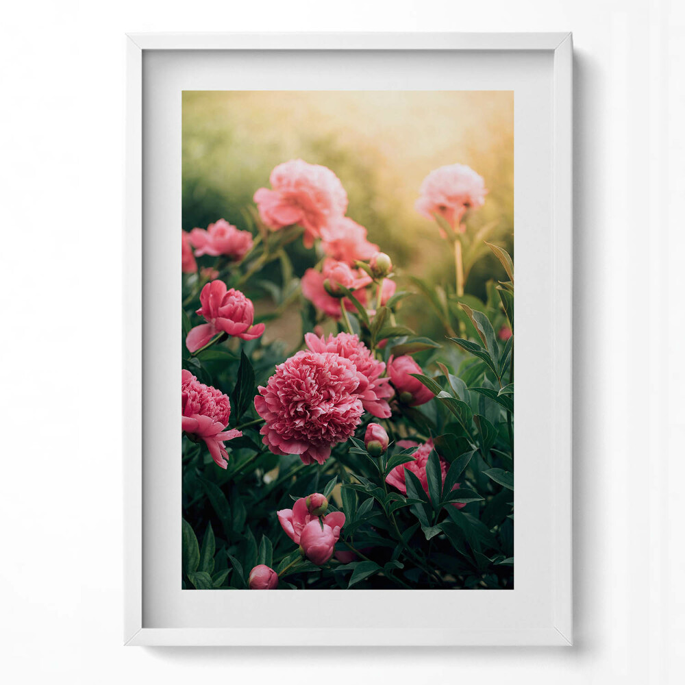 Függőleges kép keretben Rózsaszín virágok zöld levelekkel