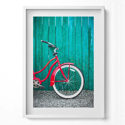 Függőleges kép keretben Piros kerékpár zöld háttér előtt