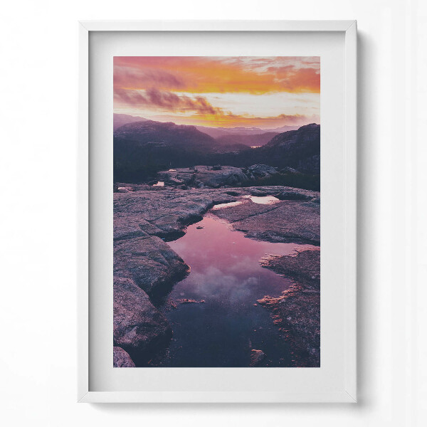 Függőleges kép keretben Naplemente sziklás tájon