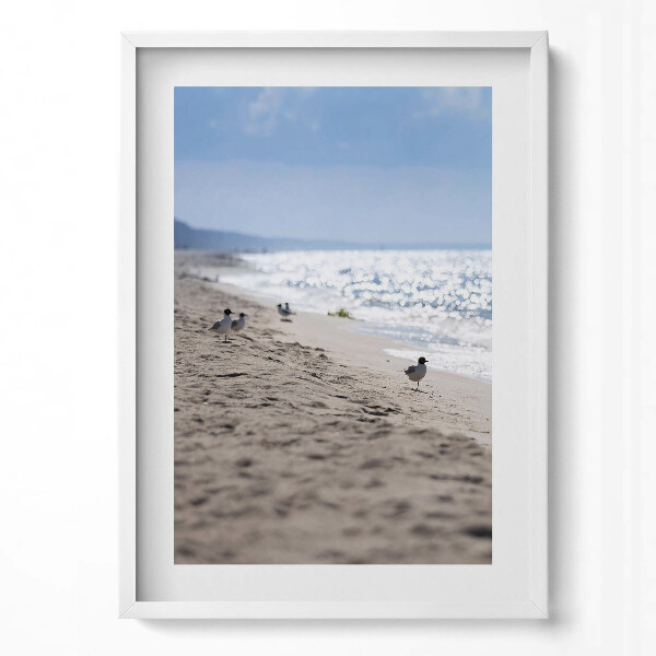 Függőleges kép keretben Tengerparti táj madár a homokban