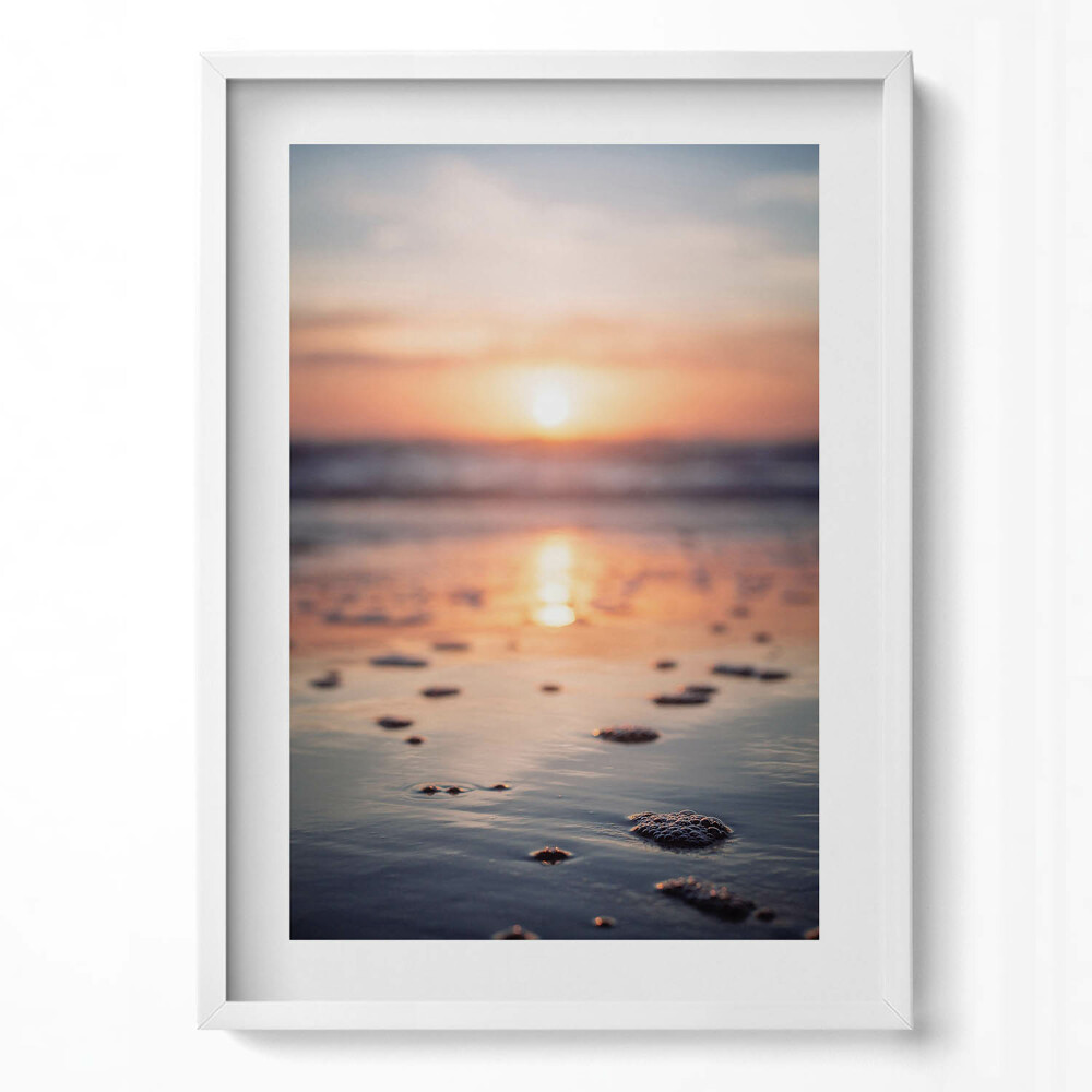 Függőleges kép keretben Naplemente a tengerparton