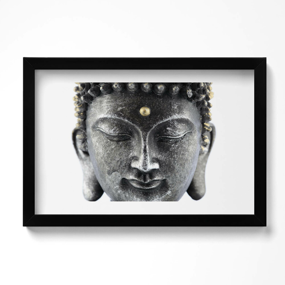 Keretezett kép Egy Buddha szobor feje
