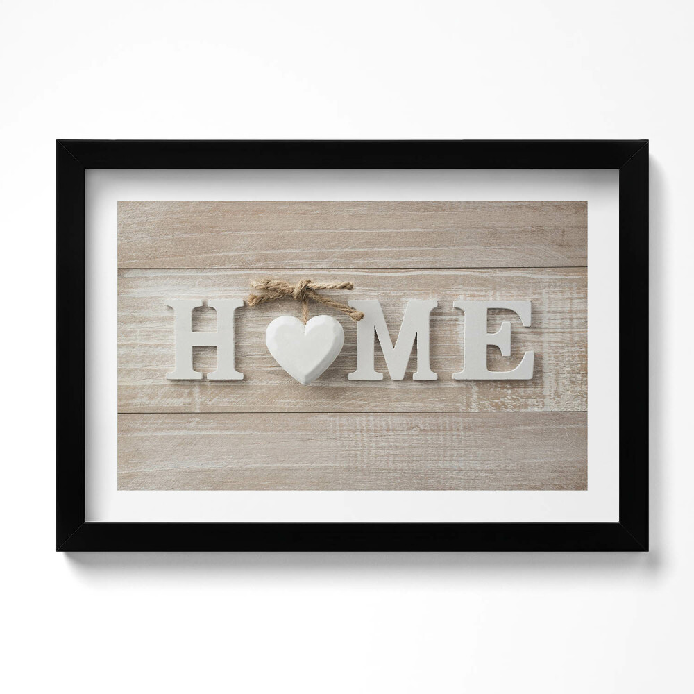 Keretezett kép Otthon felirat