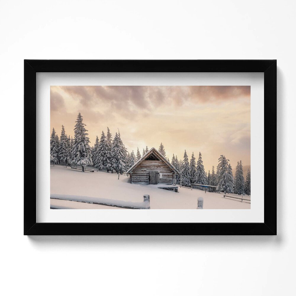 Kép keretben Tájkép egy hegyi kunyhóról télen és naplementében