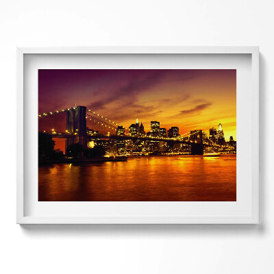 Kép keretben Naplemente a város felett