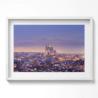 Kép keretben Szent Család-templom városi látképe