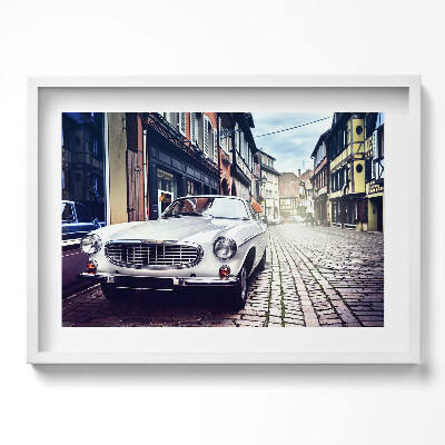 Kép keretben Fehér klasszikus autó városi utca