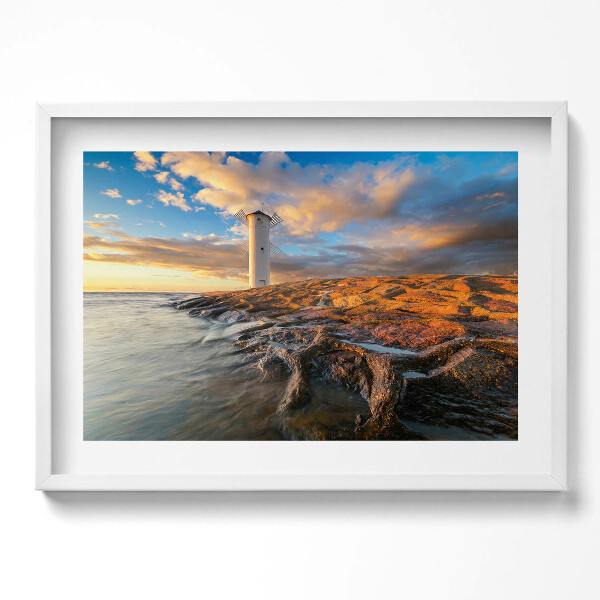 Kép keretben Tengerparti világítótorony naplementében