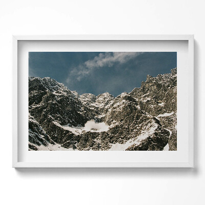 Kép keretben Havas hegycsúcsok kék ég