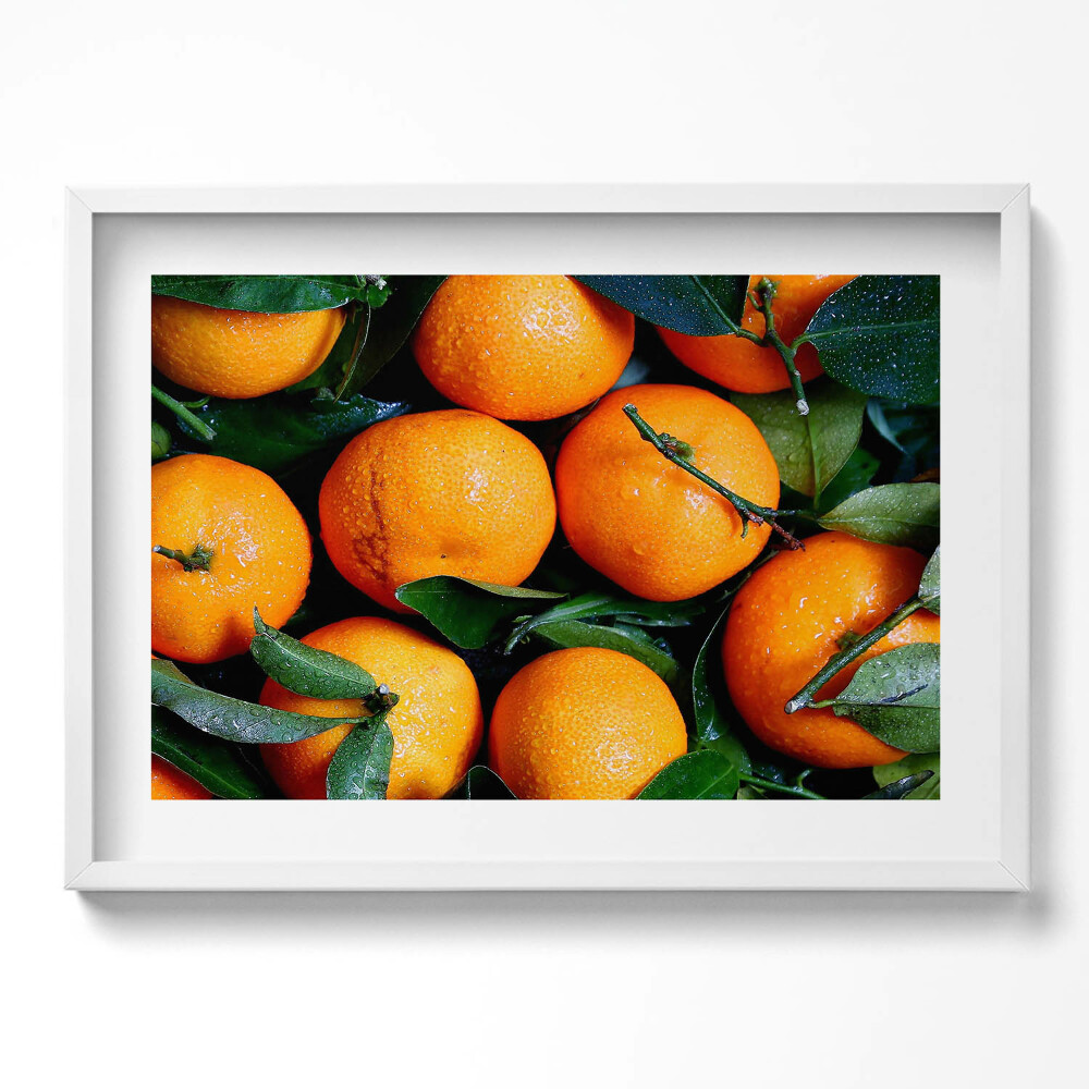 Kép keretben Narancsok zöld levelekkel