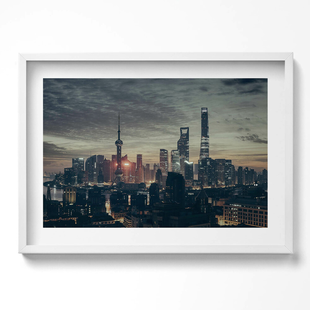 Kép keretben Modern városkép naplementében