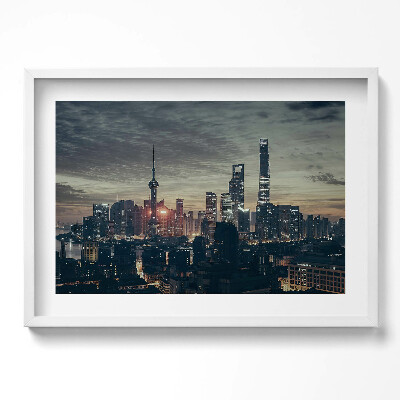 Kép keretben Modern városkép naplementében