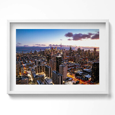 Kép keretben Városi táj naplementében