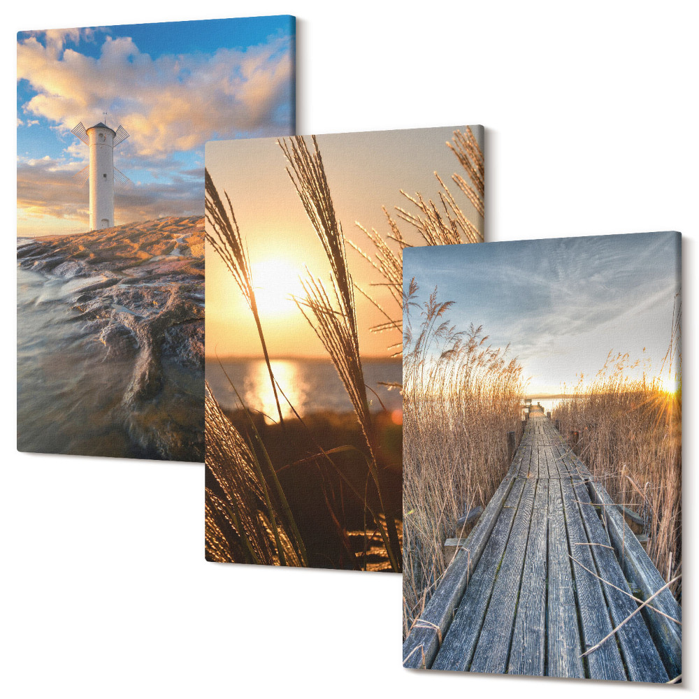 Falikép szett triptichon Kilátás a világítótoronyra a tenger mellett, a fű és a fából készült móló mellett