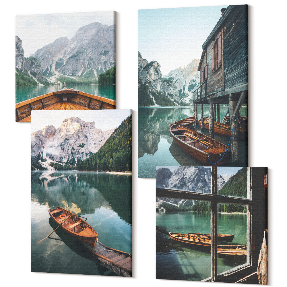 Négy részes vászonkép Kilátás egy hegyi tóra csónakokkal és egy házzal a víz mellett